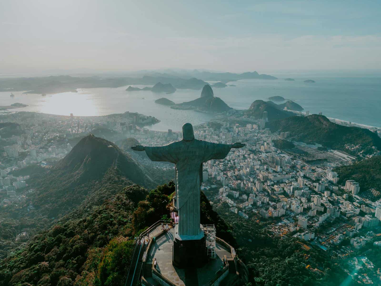 Stunning aerial view of Christ the Redeemer overlooking Rio de Janeiro's coastline.